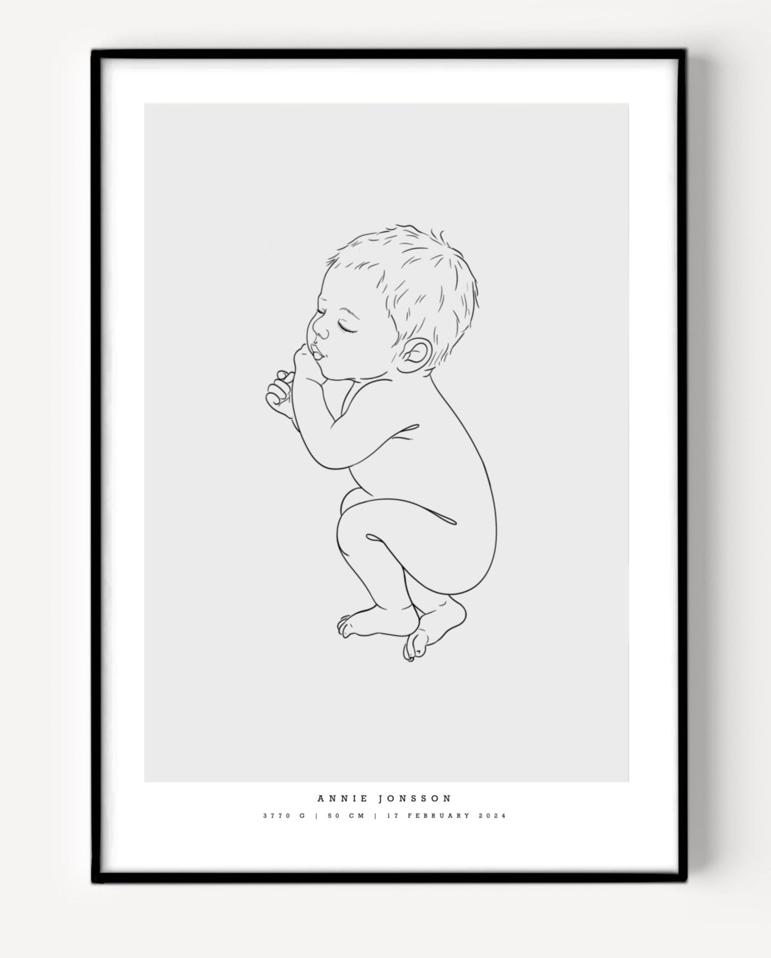 Illustration of a newborn baby lying on the side, featured on a birth poster
